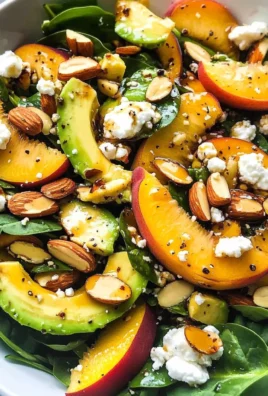 Summer Peach Spinach Salad with Avocado, Toasted Almonds + Goat Cheese