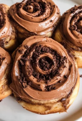 Chocolate cinnamon rolls with chocolate cream cheese frosting