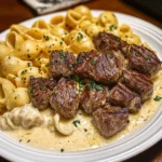 Steak Bites and Shell Pasta in Garlic Butter Alfredo Sauce