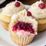 Almond Wedding Cake Cupcakes with Raspberry Filling